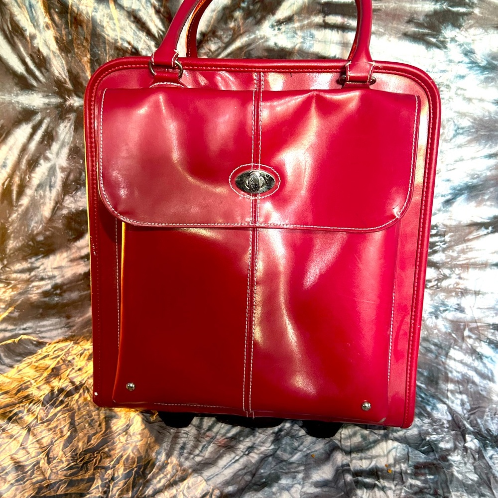 Wilson Leather Red Rolling
Backpack Carry-on Luggage Bag.